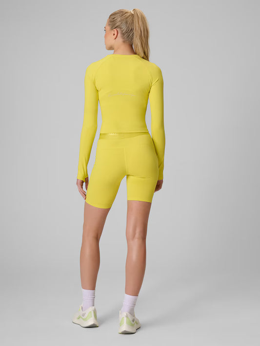 Женские короткие леггинсы для фитнеса 4F F122 4FWAW26TFSTF122 yellow