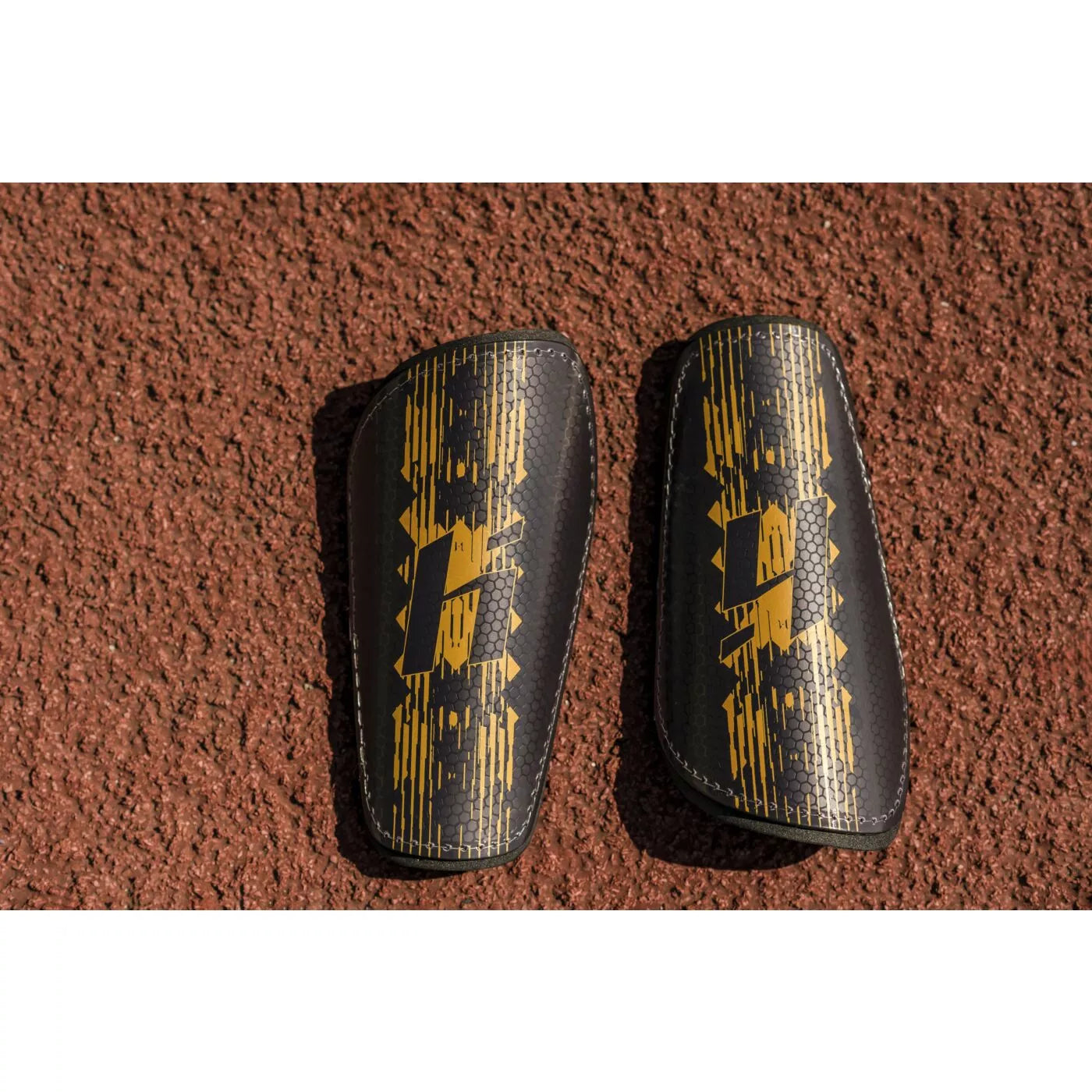 Защита голени Edson Huari black/gold
