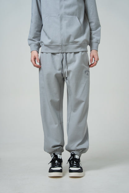 Pantaloni spotivi pentru bărbați Peak FWB253031 lt.grey
