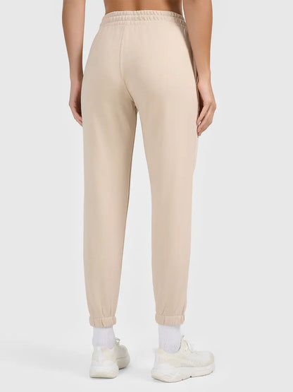 Joggeri pentru femei casual 4F F1754 4FWAW26TTROF1754 beige
