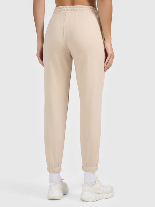 Joggeri pentru femei casual 4F F1754 4FWAW26TTROF1754 beige